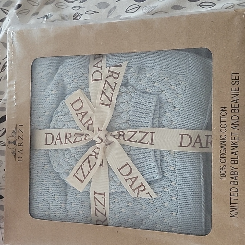 Knitted baby blanket and beanie set